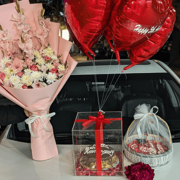 “Royal Grace Hamper” – Flowers, Cake Box, Balloons, Chocolates & Gajray for Her