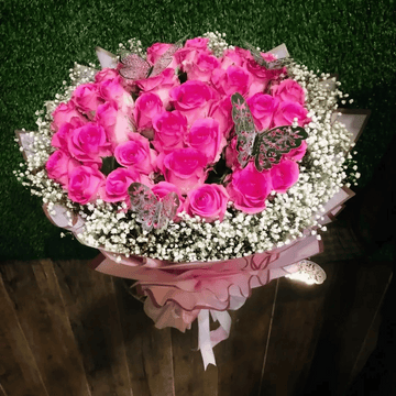 Timeless Beauty: A Rose and Baby's Breath Arrangement