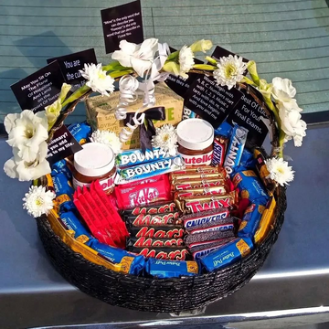 Luxurious Chocolate Basket with Fresh Flowers β A Perfect Sweet Surprise