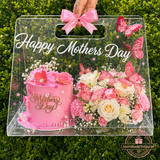 Luxury Mother’s Day acrylic gift box with Happy Mothers Day text, pink cake, pastel flowers, butterfly decorations, pink ribbon