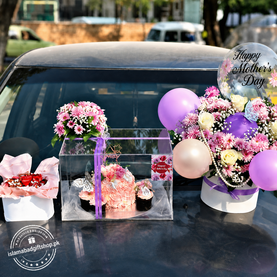 Decorative setup on a car with flowers, balloons, and a cake for Mother's Day.