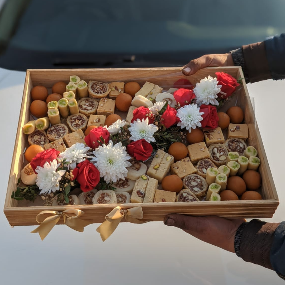 Festive Eid Mithai & Bright Roses Arrangement
