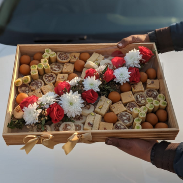 Festive Eid Mithai & Bright Roses Arrangement