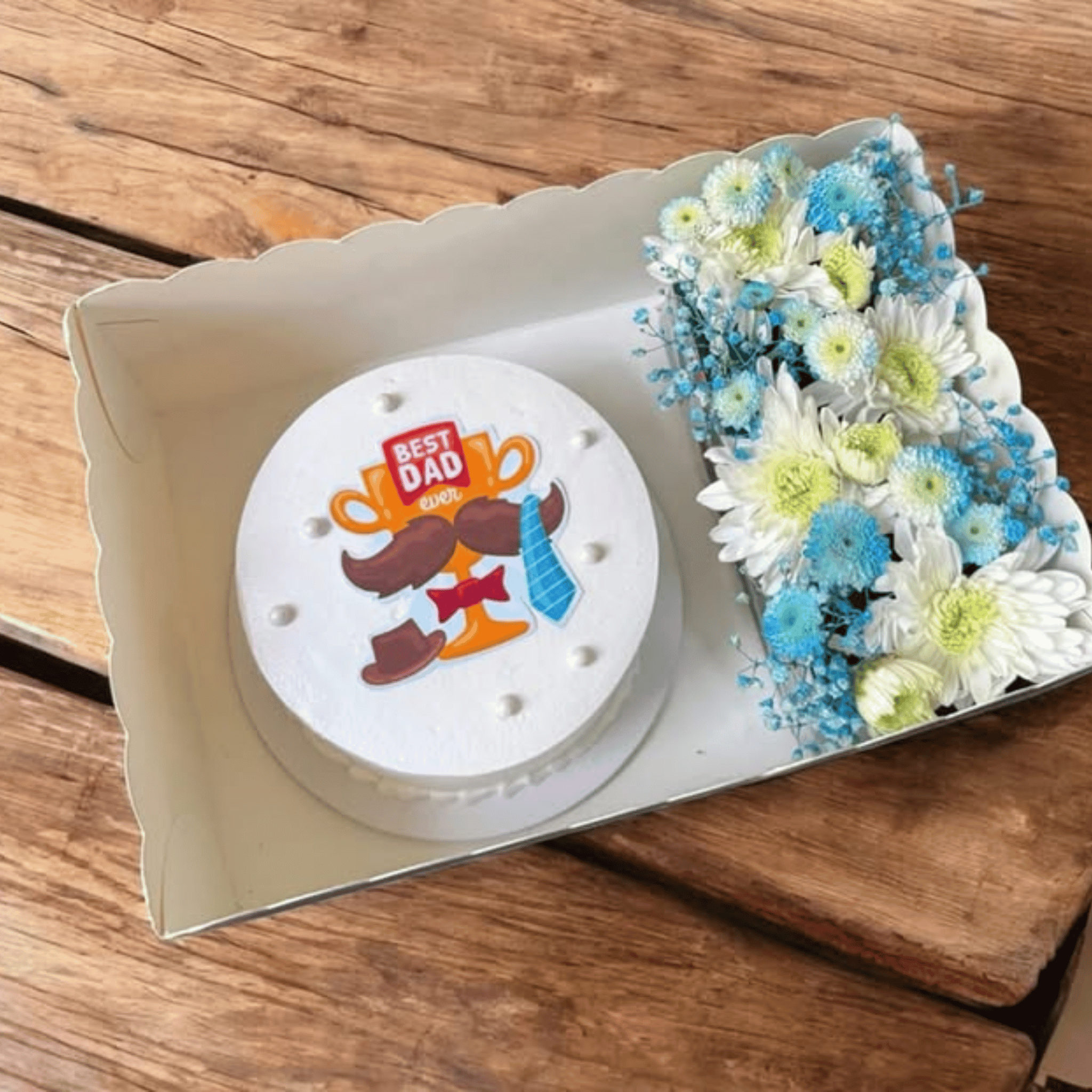 Bloom & Bite” – Custom Cake with Chrysanthemum Arrangement