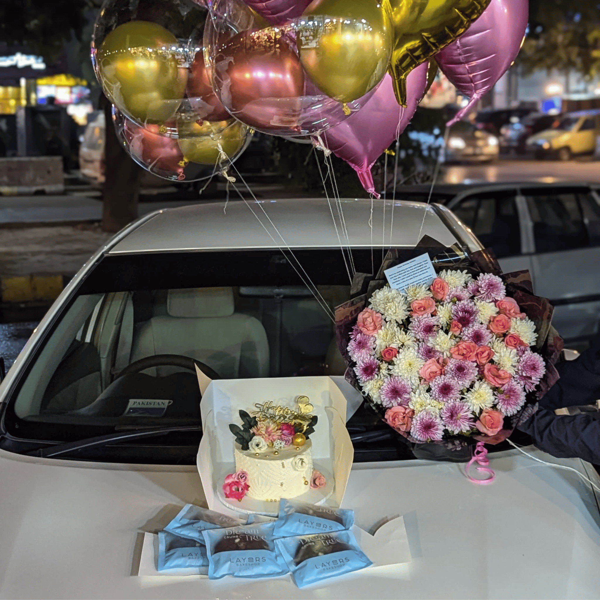 "Luxe Combo” – Premium Flowers Bouquet,Customized Cake,Cookies &Helium Balloons