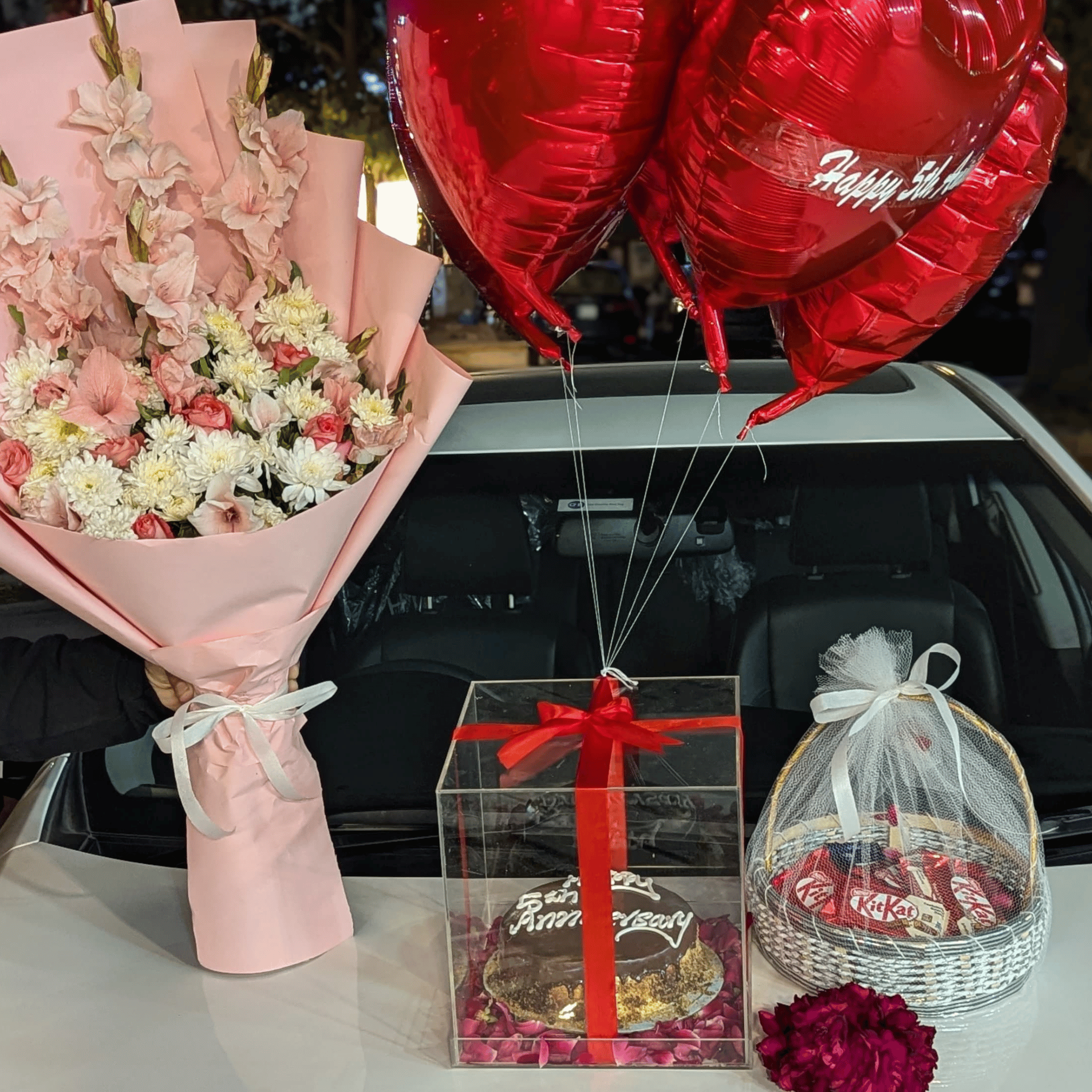 “Royal Grace Hamper” – Flowers, Cake Box, Balloons, Chocolates & Gajray for Her