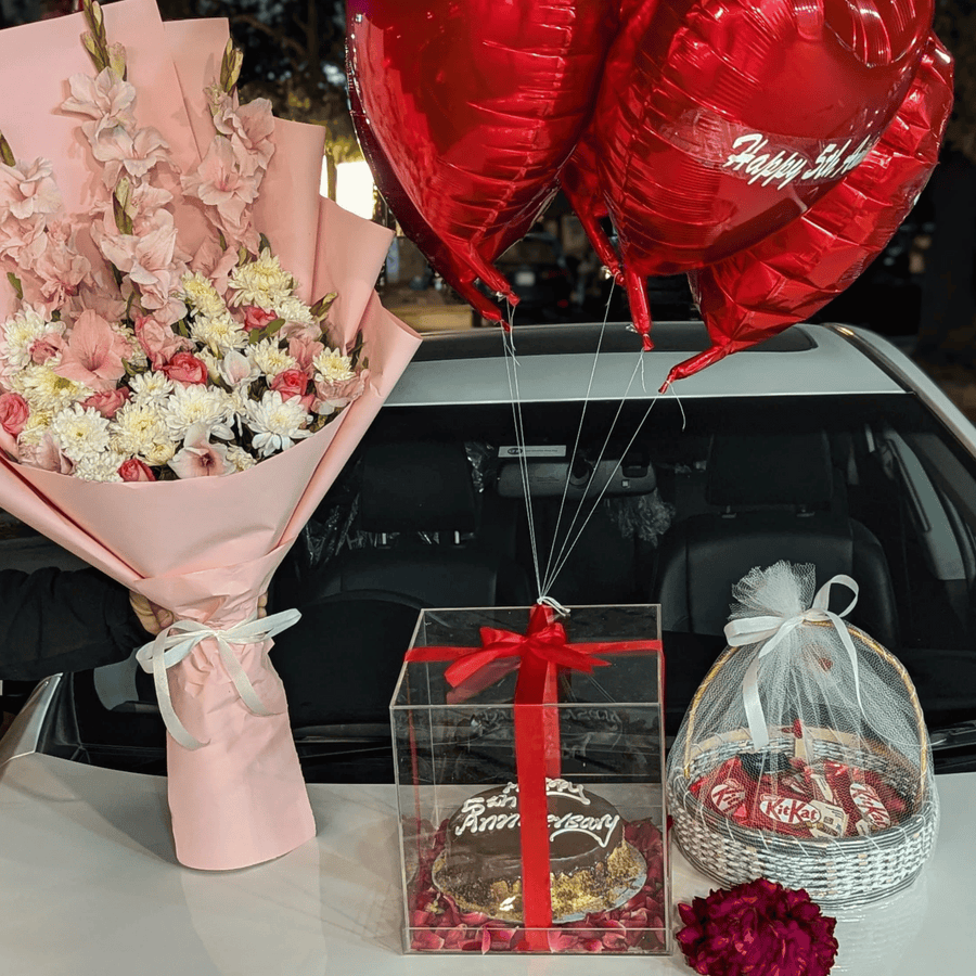 “Royal Grace Hamper” – Flowers, Cake Box, Balloons, Chocolates & Gajray for Her