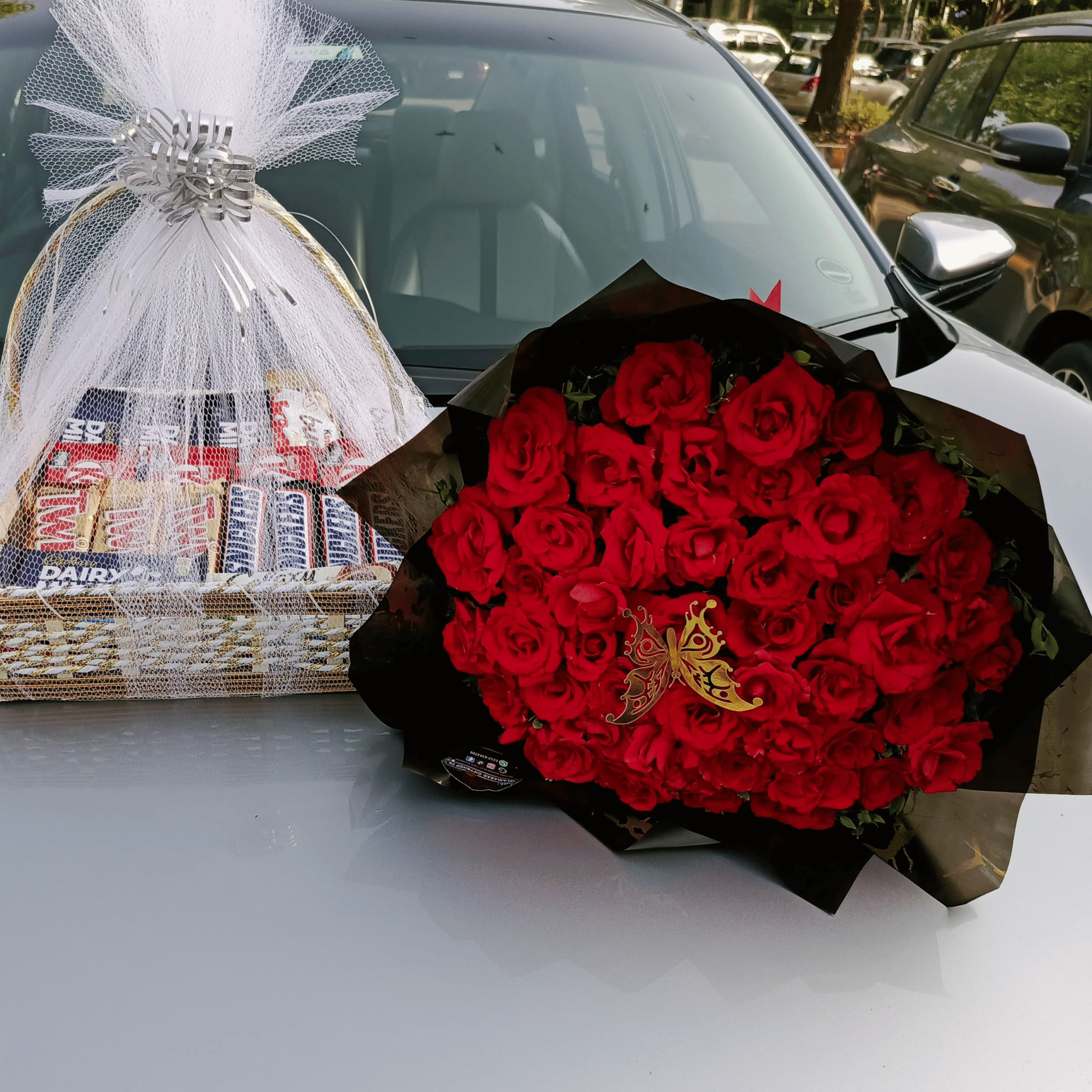 Fresh Red Roses Bouquet with Chocolates Basket– Treat Her Specially