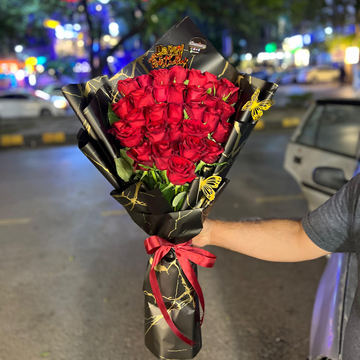 Luxury Red Roses Wrapped in Black Wrapping Sheets