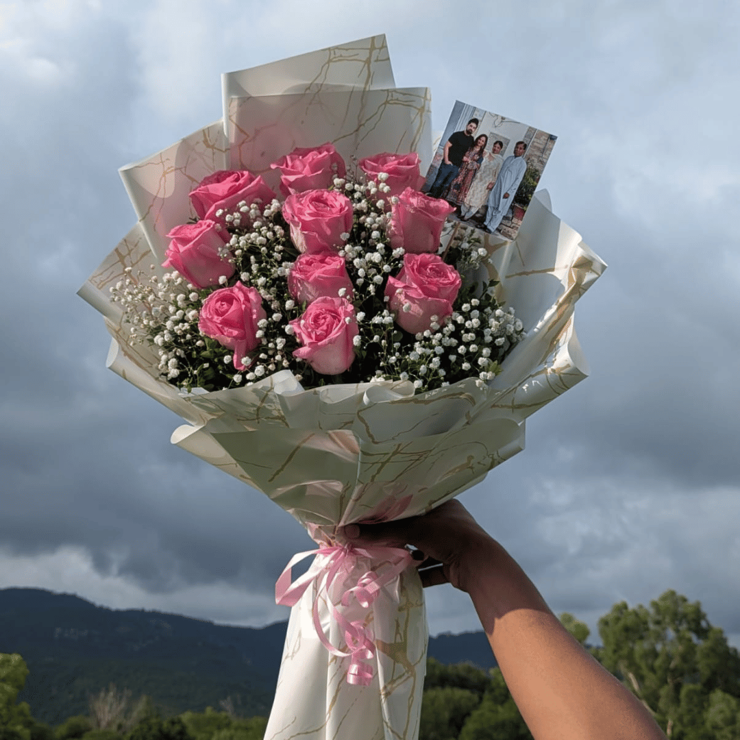 The Perfect Blend: Pink Roses and Baby's Breath