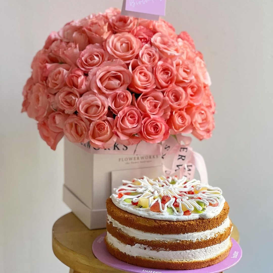 Elegant White & Pink Rose Box with Fruit Cake – A Perfect Gift of Love & Sweetness