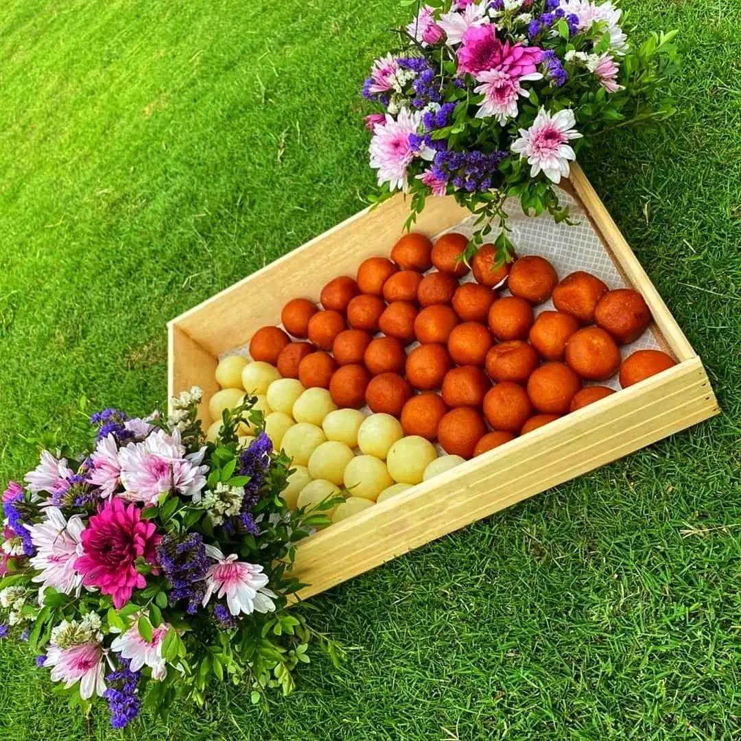 Luxurious Mithai Tray with Floral Decoration – Featuring Gulab Jamun & Rasgulla
