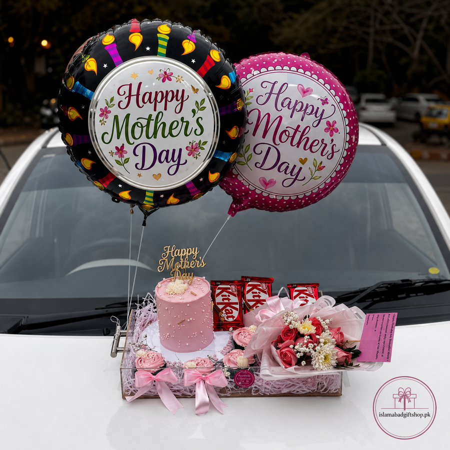 Luxury Mother’s Day gift tray with Happy Mother’s Day balloons, pink cake, flower bouquet, chocolates, ribbons, greeting card.