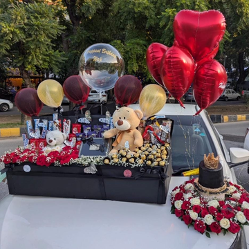 Luxury Valentine Deal – Big Gift Box with Imported Chocolates, Teddy Bear, Red Roses, Flowers, Perfume & Customized Balloons
