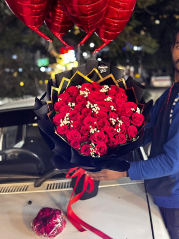 mported Red Roses Bouquet with Heart Foil Balloons
